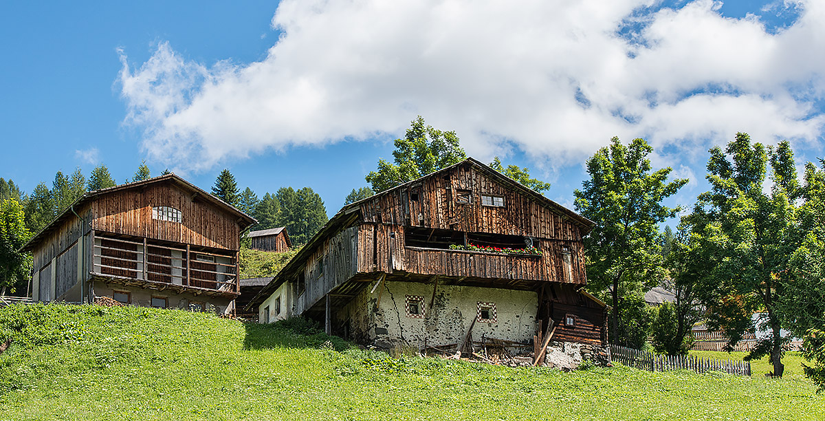 Ancient houses in wood and stone typical of Ladin culture