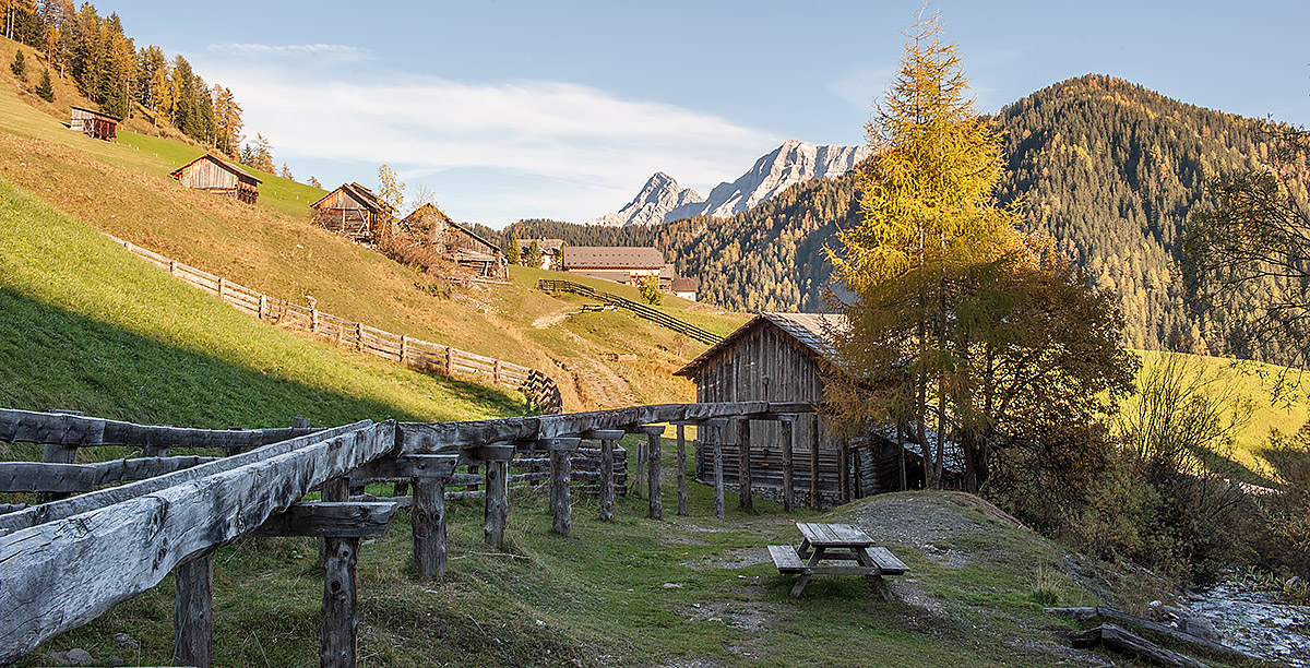 Some small farms on the slope of a mountain in Alta Badia