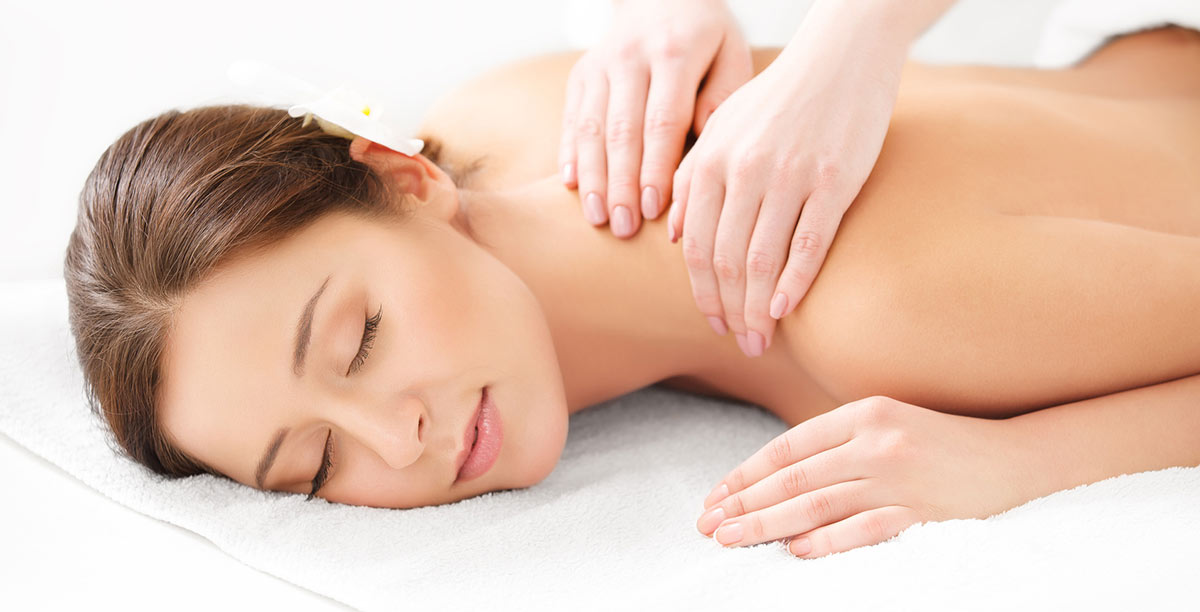 Woman relaxes during a massage